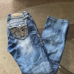 Rock Revival Blue Straight Leg Jeans with Vintage Distressing